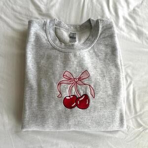 Adorable cherry bow embroidered crewneck